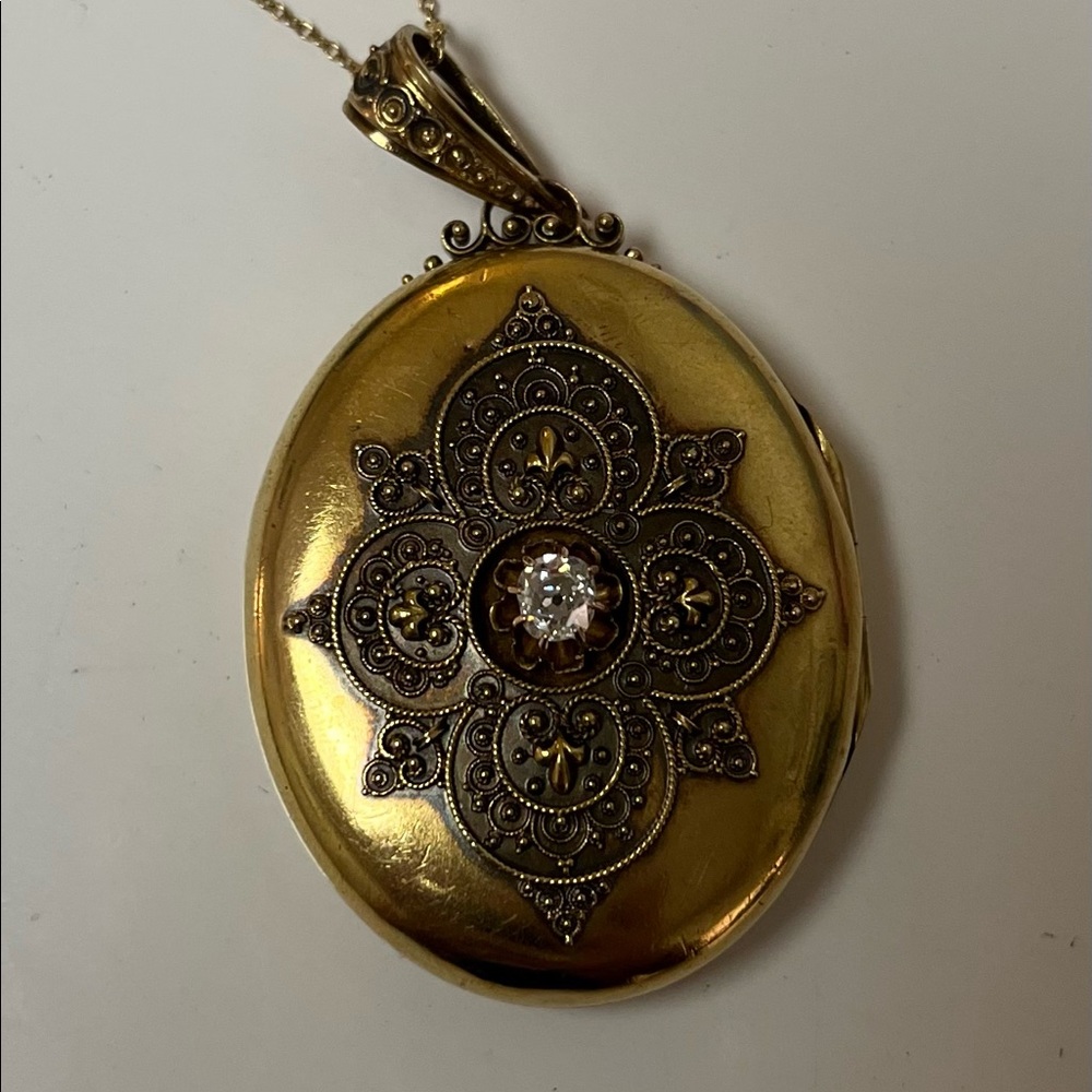 Antique 14k gold and mine cut diamond locket